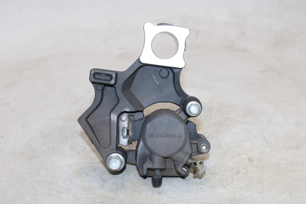 2007 Suzuki GSXR600 OEM REAR BACK BRAKE CALIPER W MOUNT BRACKET
