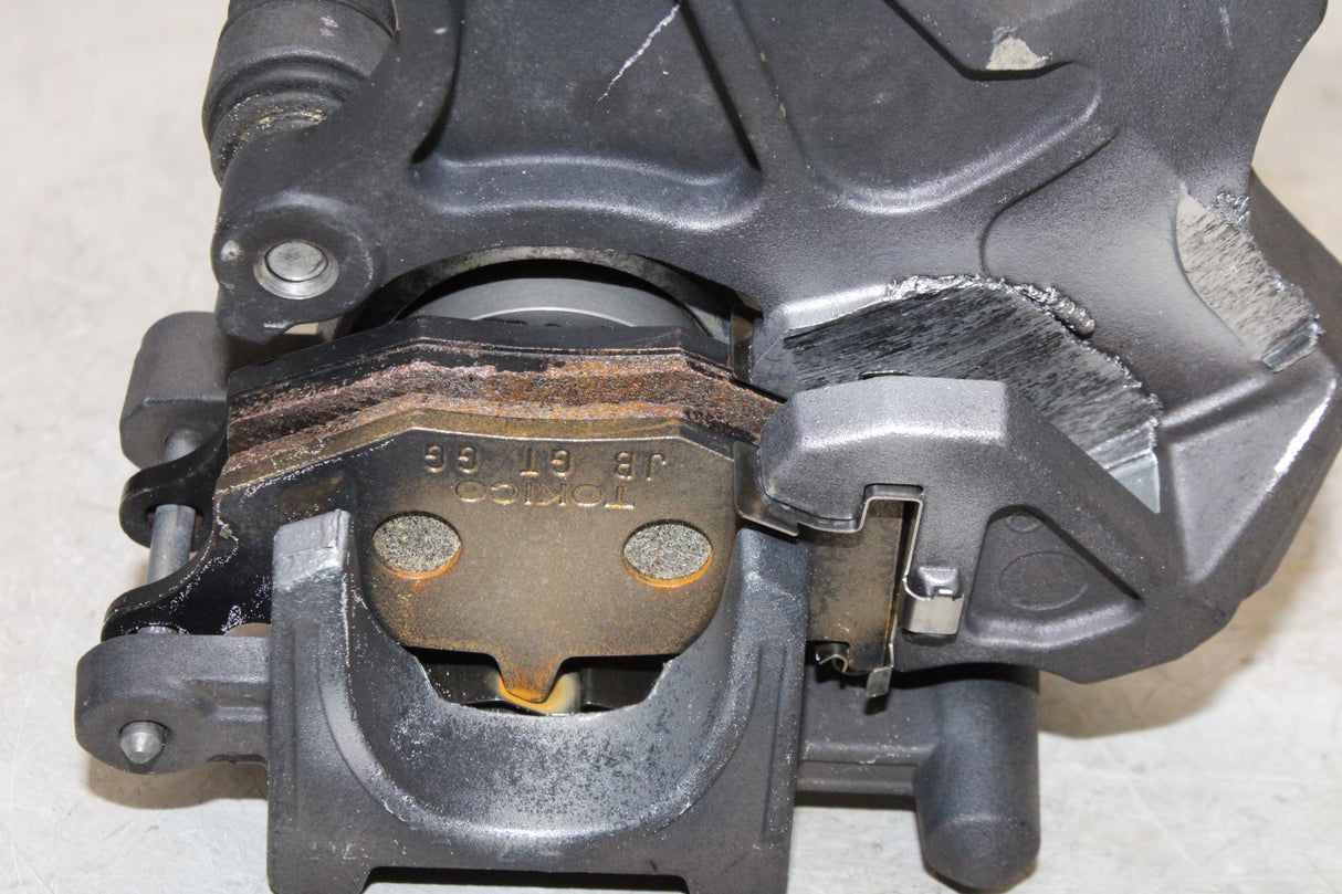 2007 Suzuki GSXR600 OEM REAR BACK BRAKE CALIPER W MOUNT BRACKET