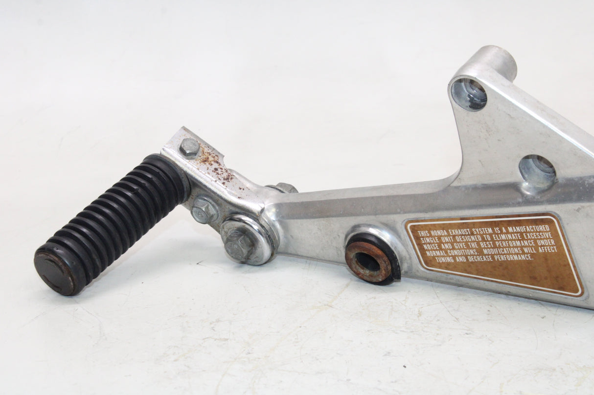 1980 Honda CB750F OEM RIGHT REAR BACK PASSENGER PEG W BRACKET