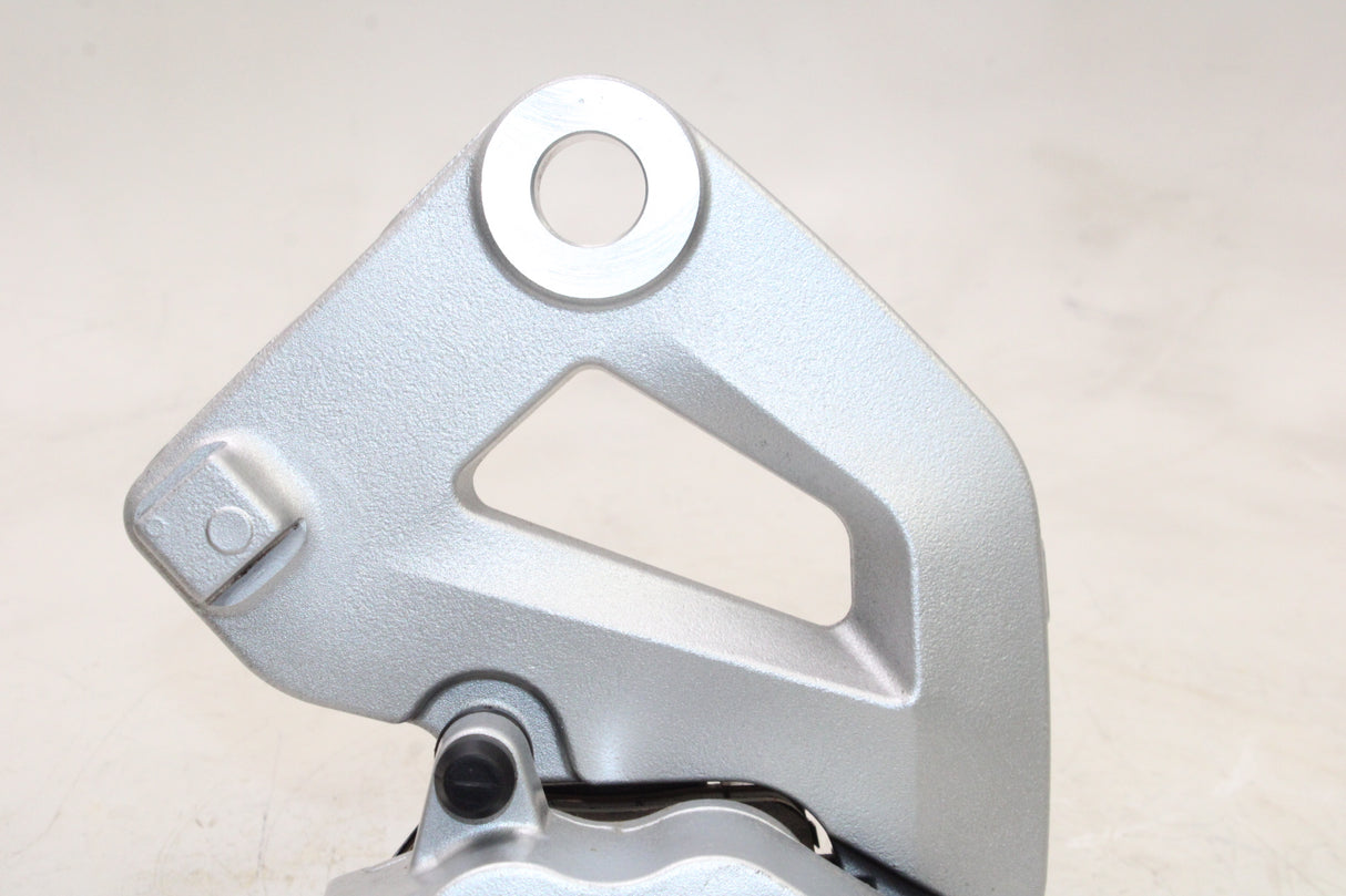 2009 Victory Vegas OEM REAR BACK BRAKE CALIPER W MOUNT BRACKET