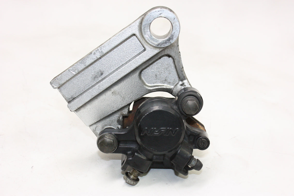 2004 Triumph Daytona 600 OEM REAR BACK BRAKE CALIPER W MOUNT BRACKET