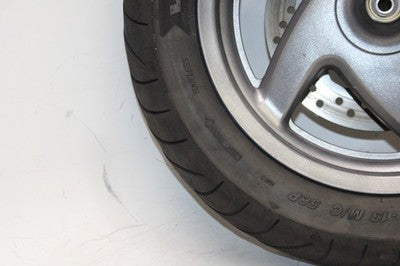 04-07 HONDA REFLEX SPORT 250 NSS250S OEM FRONT WHEEL RIM W TIRE