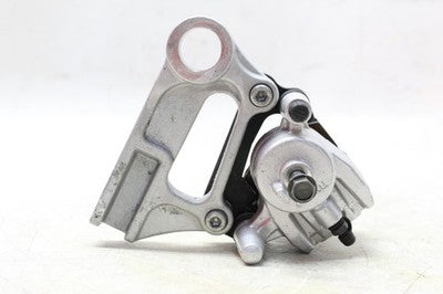05-08 KAWASAKI ZZR600 ZX600J OEM REAR BACK BRAKE CALIPER W MOUNT BRACKET