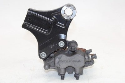 06-24 KAWASAKI VULCAN 900 VN900B CLASSIC OEM REAR BRAKE CALIPER W MOUNT BRACKET