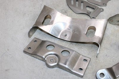 06-07 SUZUKI GSXR 750 OEM MOUNTING BRACKETS MOUNTS CHROME COVERS