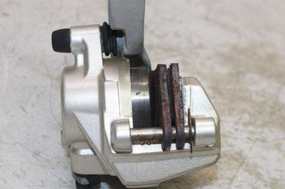 2011 APRILIA DORSODURO 750 OEM REAR BACK BRAKE CALIPER W MOUNT BRACKET