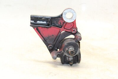06-11 KAWASAKI NINJA 650R EX650A OEM REAR BACK BRAKE CALIPER W MOUNT BRACKET