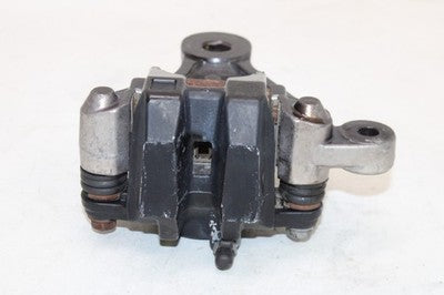 1981 KAWASAKI KZ550 OEM REAR BACK BRAKE CALIPER W MOUNT BRACKET