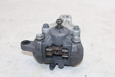 2006 SUZUKI GS500F OEM REAR BACK BRAKE CALIPER W MOUNT BRACKET