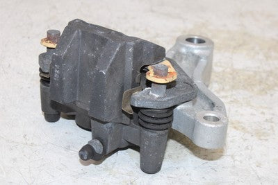 2007 KAWASAKI NINJA 250R EX250F OEM REAR BACK BRAKE CALIPER W MOUNT BRACKET