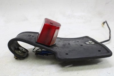 80-83 YAMAHA XT250 OEM REAR BACK TAIL LIGHT W MOUNT BRACKET