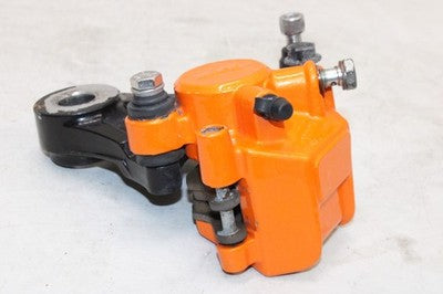 2001 BUELL BLAST P3 OEM REAR BACK BRAKE CALIPER W MOUNT BRACKET