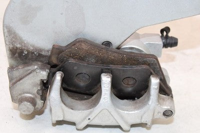 2006 VICTORY HAMMER OEM REAR BACK BRAKE CALIPER W MOUNT BRACKET