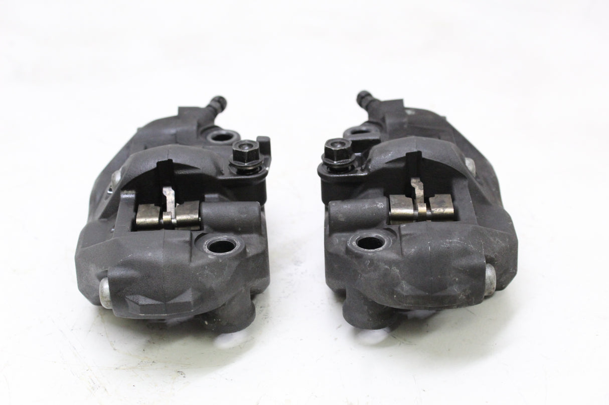 2006 Honda CBR600RR OEM RIGHT LEFT FRONT BRAKE CALIPER SET PAIR CALIPERS