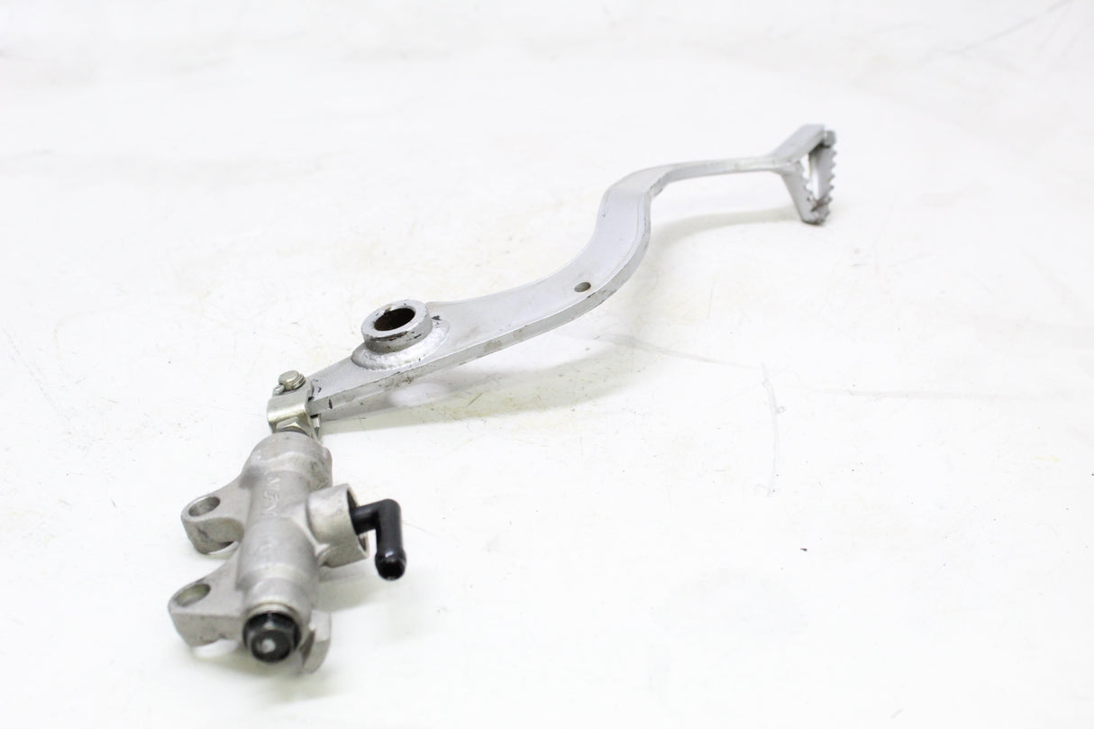 2011 KAWASAKI KLR650 OEM REAR BRAKE PEDAL W MASTER CYLINDER