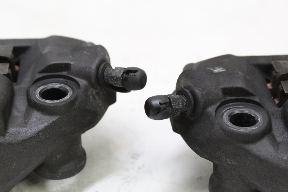 2006 Honda CBR600RR OEM RIGHT LEFT FRONT BRAKE CALIPER SET PAIR CALIPERS