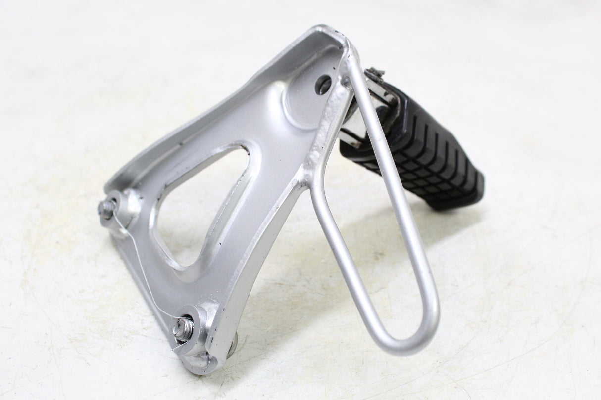 2007 Kawasaki KLR650 OEM LEFT REARSET REAR SET DRIVER FOOT PEG REST STOP