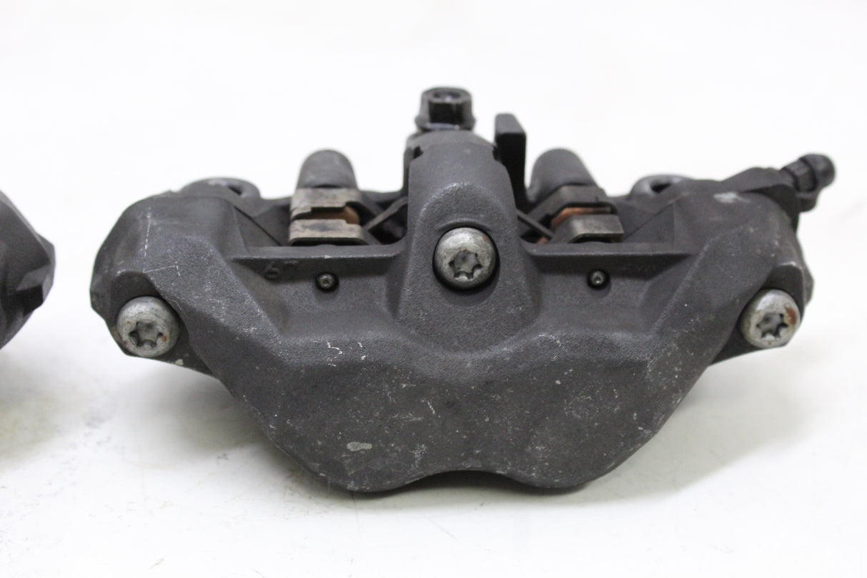 2006 Honda CBR600RR OEM RIGHT LEFT FRONT BRAKE CALIPER SET PAIR CALIPERS