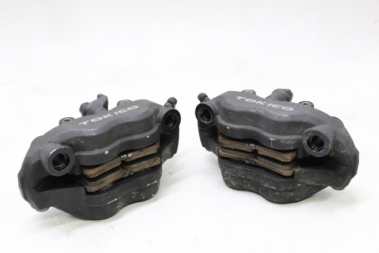 2006 Honda CBR600RR OEM RIGHT LEFT FRONT BRAKE CALIPER SET PAIR CALIPERS