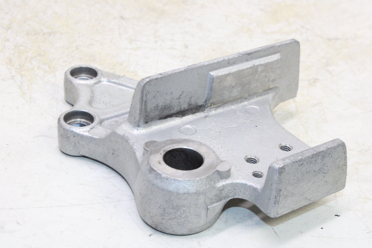 2007 Kawasaki KLR650 OEM REAR BACK BRAKE CALIPER MOUNT BRACKET