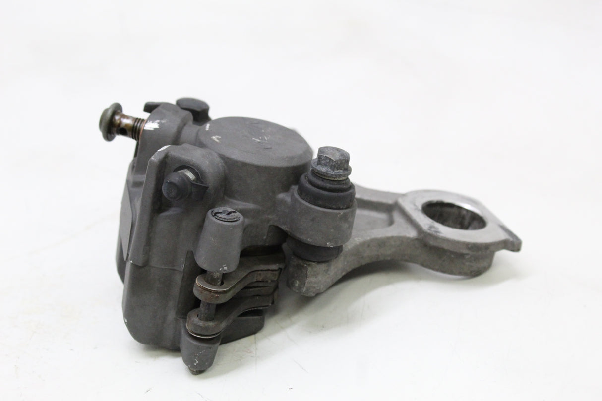 2007 Yamaha YZF R6S OEM REAR BACK BRAKE CALIPER W MOUNT