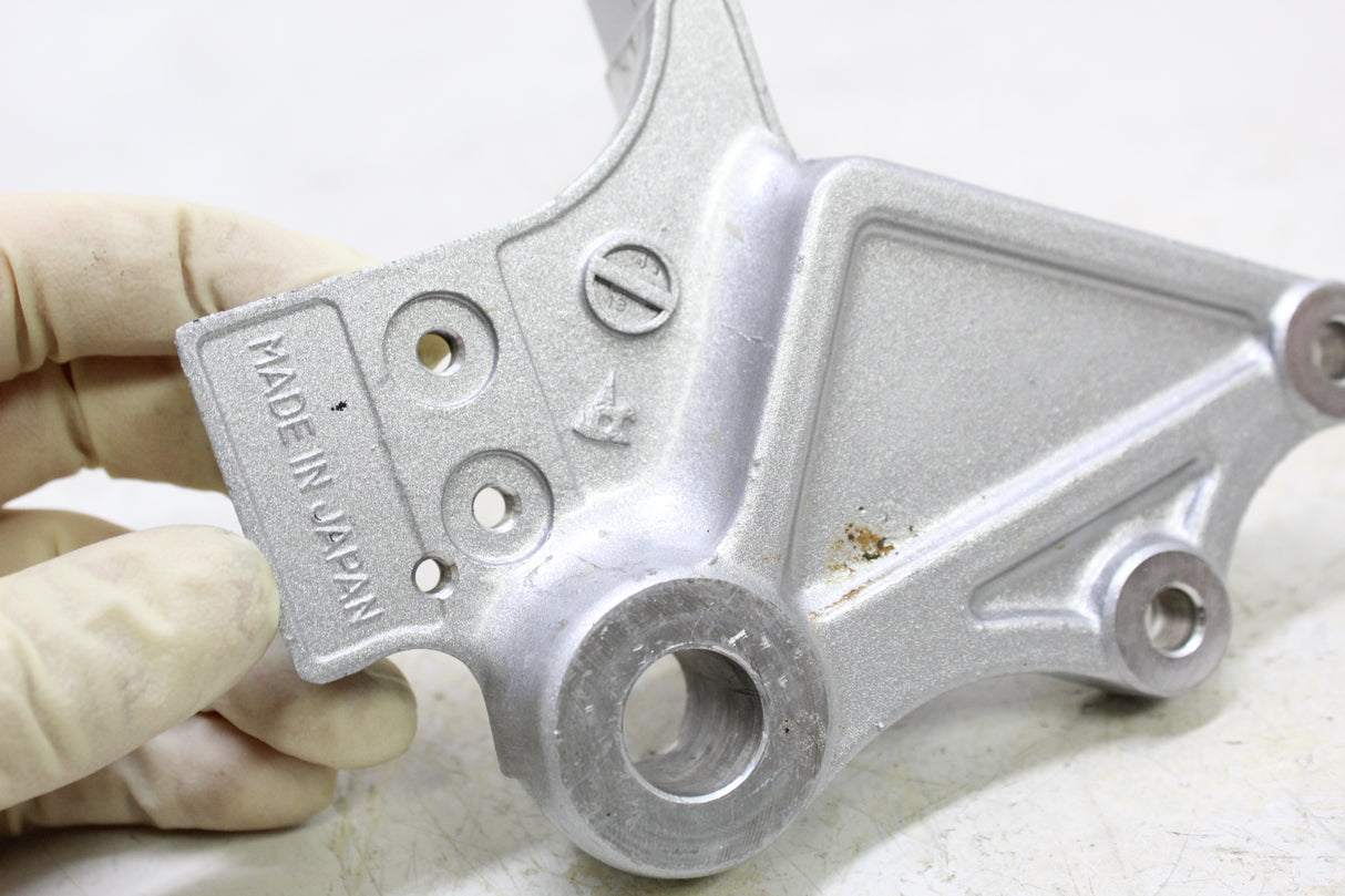 2007 Kawasaki KLR650 OEM REAR BACK BRAKE CALIPER MOUNT BRACKET