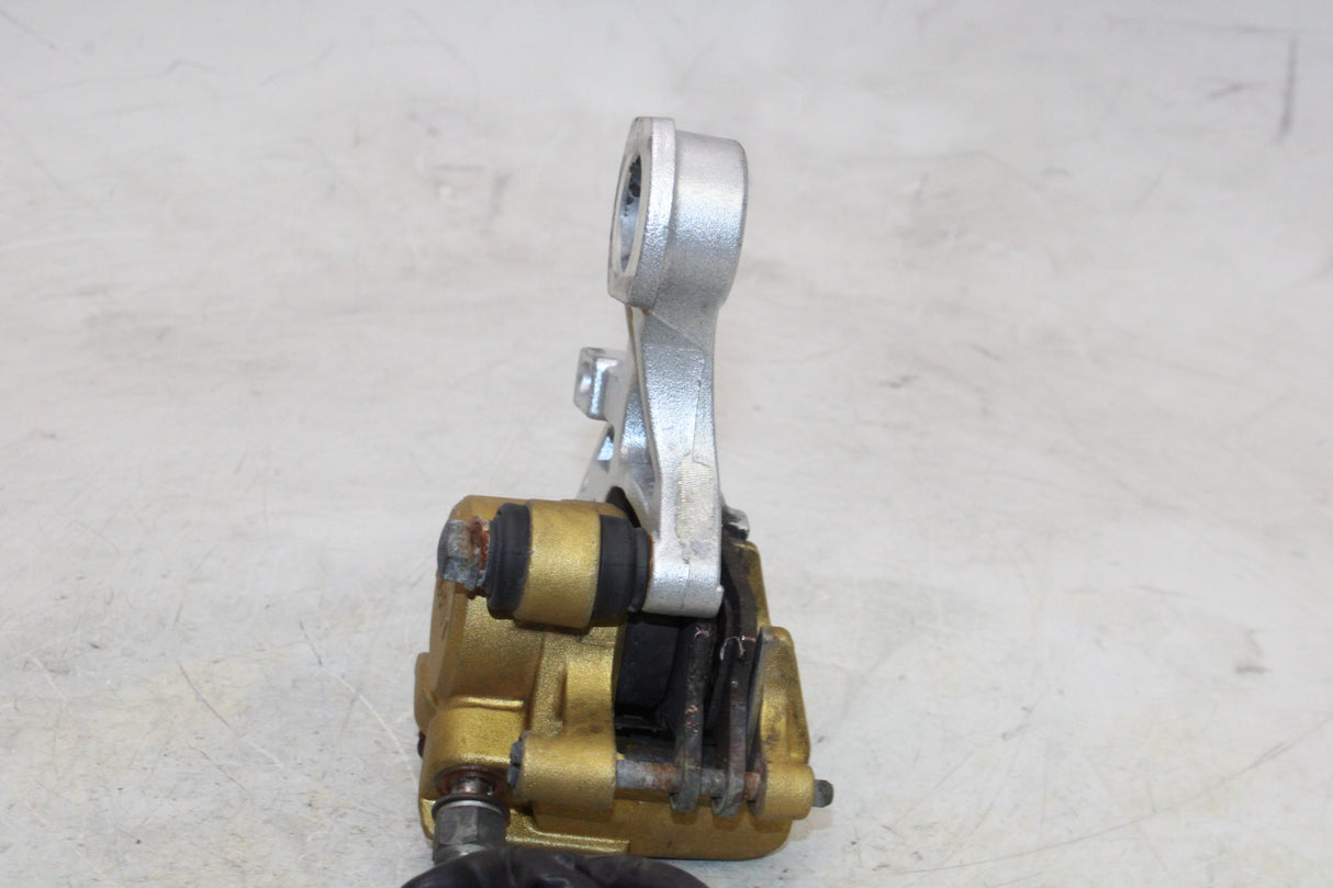 2000 Honda CBR900RR OEM REAR BACK BRAKE CALIPER W MOUNT BRACKET