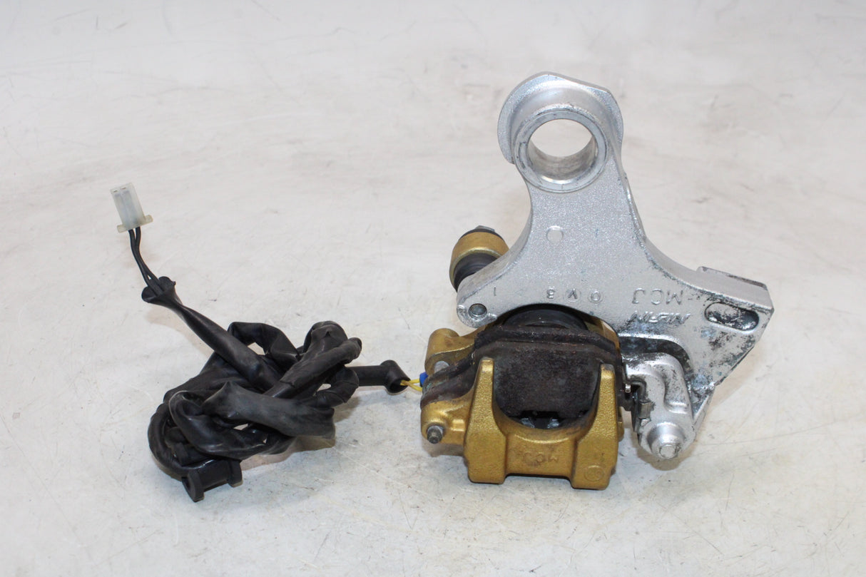 2000 Honda CBR900RR OEM REAR BACK BRAKE CALIPER W MOUNT BRACKET