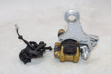 2000 Honda CBR900RR OEM REAR BACK BRAKE CALIPER W MOUNT BRACKET