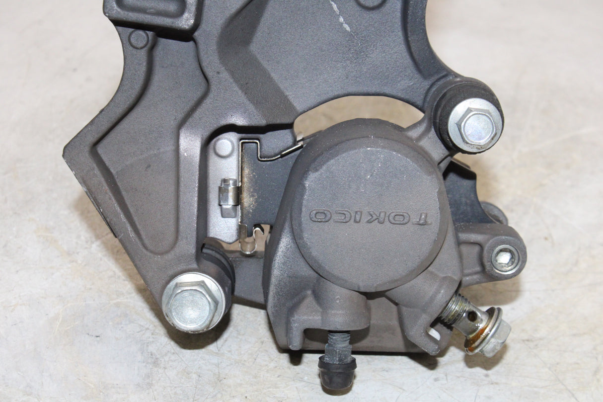 2007 Suzuki GSXR600 OEM REAR BACK BRAKE CALIPER W MOUNT BRACKET