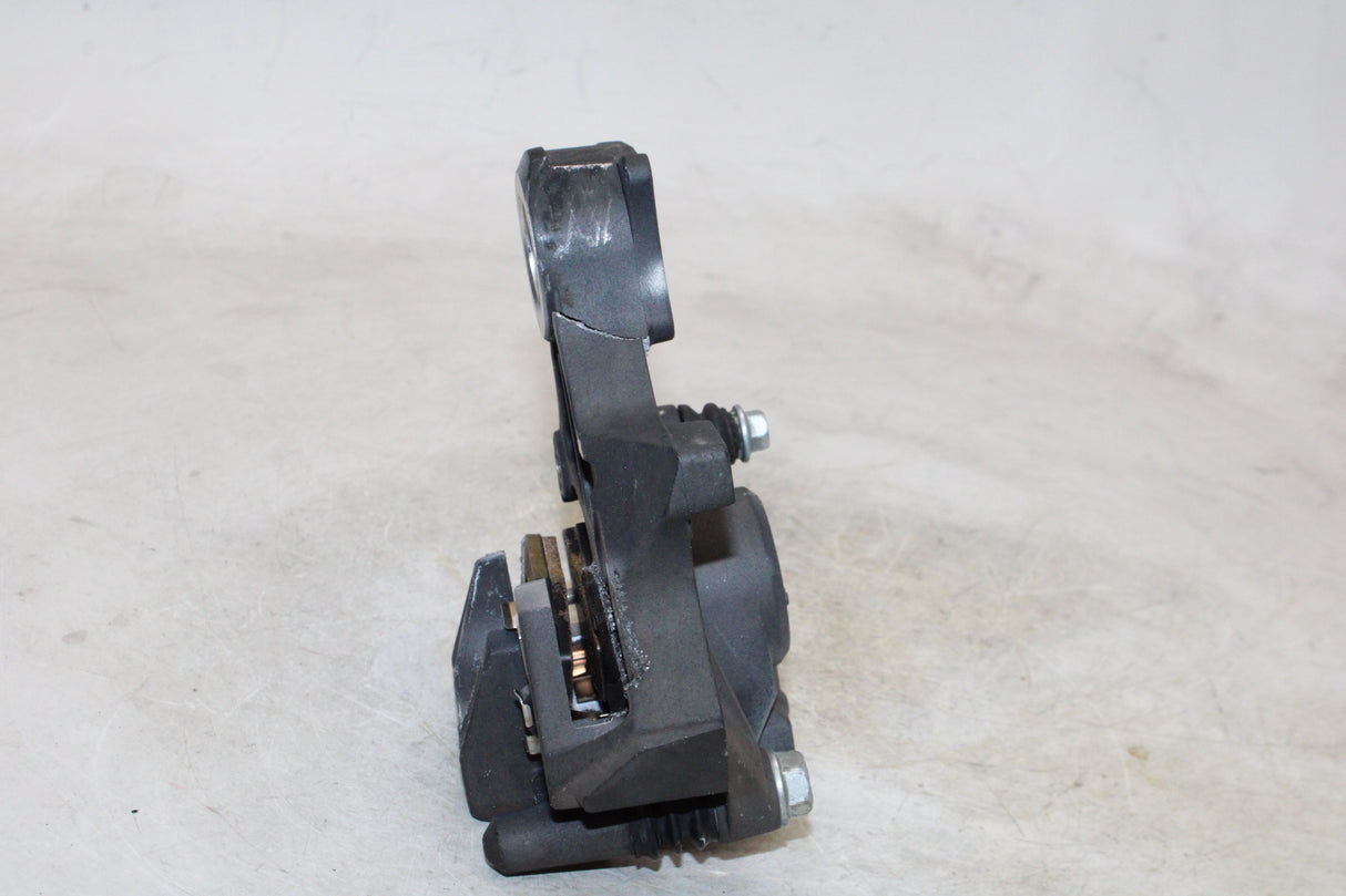 2007 Suzuki GSXR600 OEM REAR BACK BRAKE CALIPER W MOUNT BRACKET