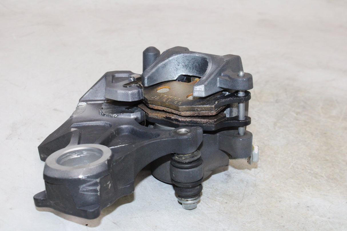 2007 Suzuki GSXR600 OEM REAR BACK BRAKE CALIPER W MOUNT BRACKET
