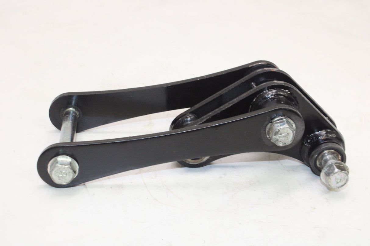 2009 Kawasaki Ninja 250R EX250J OEM REAR DOGBONE SHOCK LINKAGE LINK