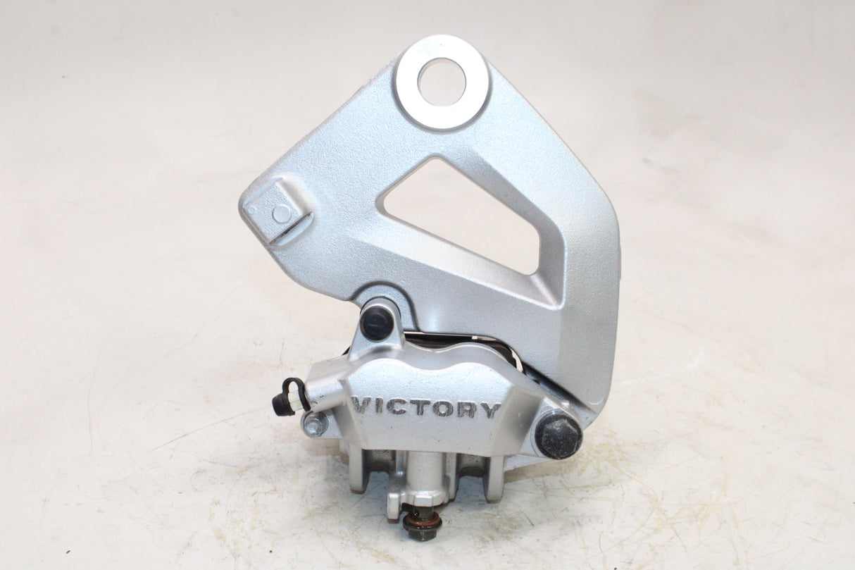 2009 Victory Vegas OEM REAR BACK BRAKE CALIPER W MOUNT BRACKET