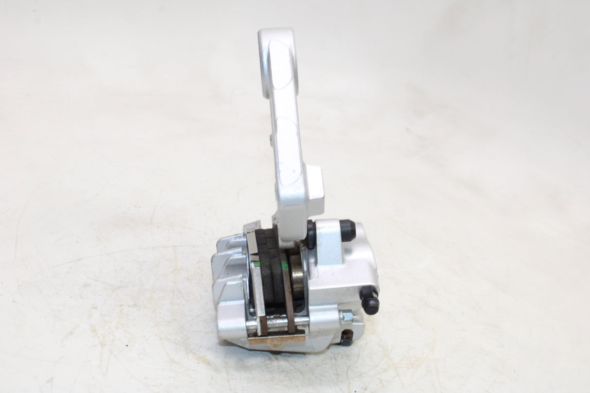 2009 Victory Vegas OEM REAR BACK BRAKE CALIPER W MOUNT BRACKET