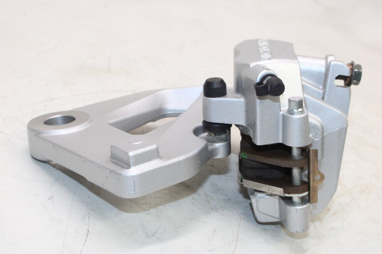 2009 Victory Vegas OEM REAR BACK BRAKE CALIPER W MOUNT BRACKET