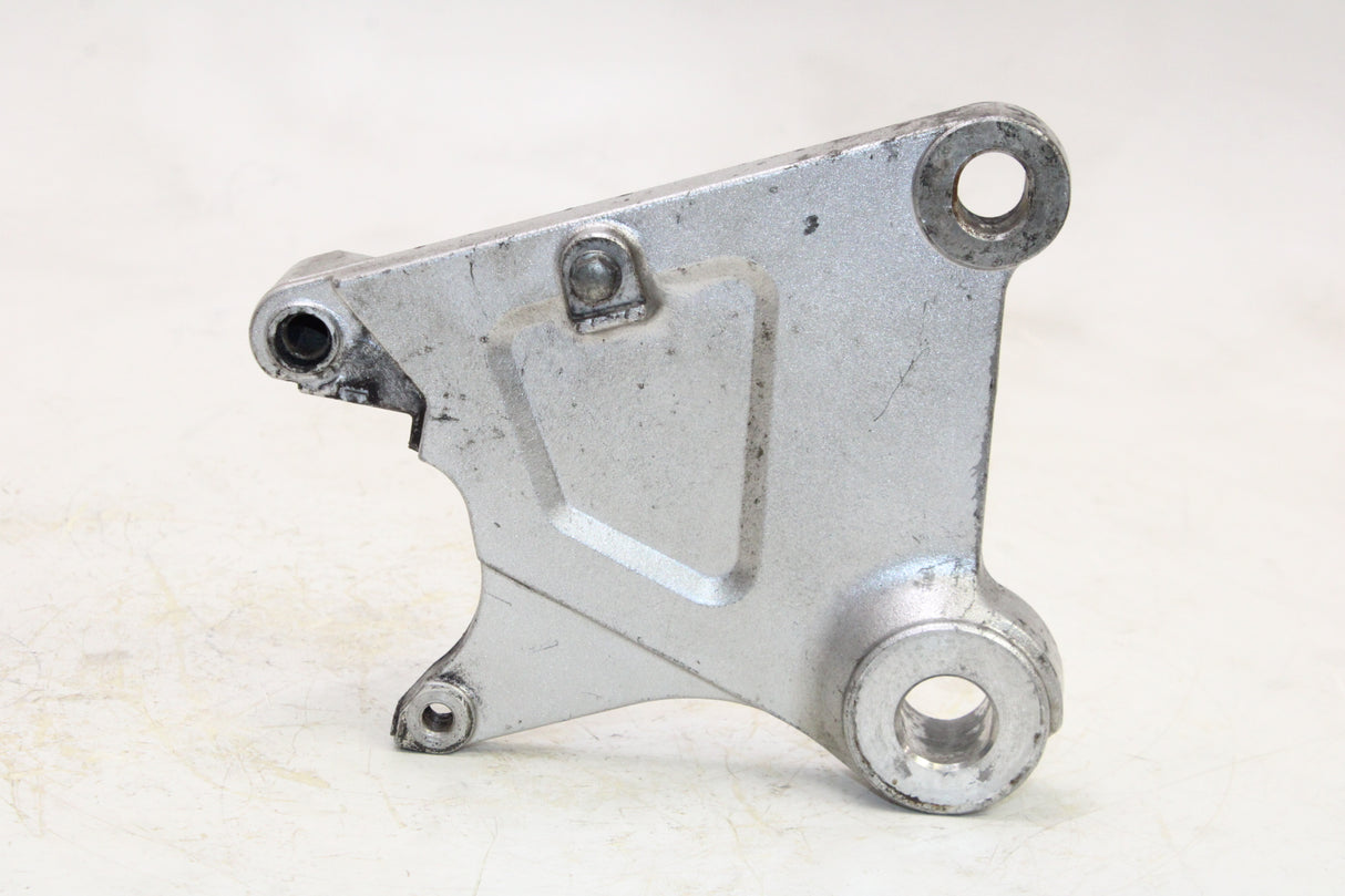 2004 Honda VTX1300C OEM REAR BACK BRAKE CALIPER MOUNT BRACKET