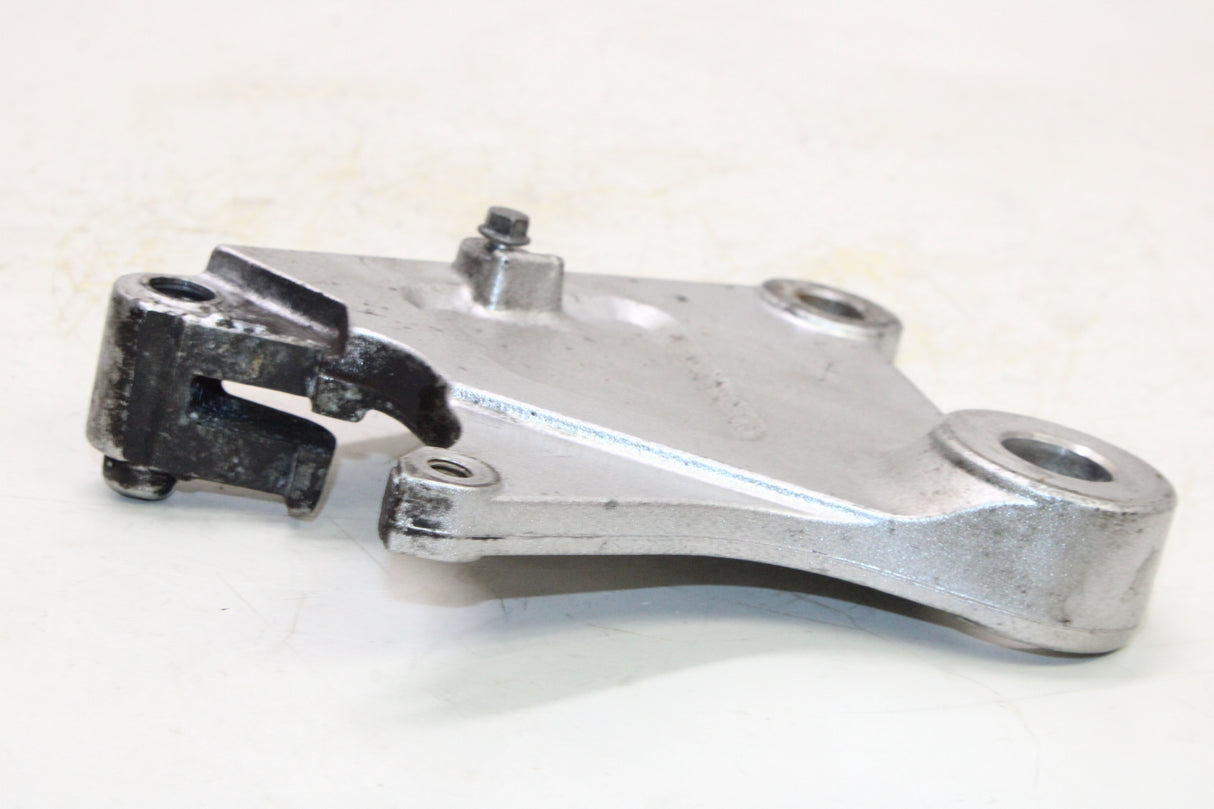 2004 Honda VTX1300C OEM REAR BACK BRAKE CALIPER MOUNT BRACKET