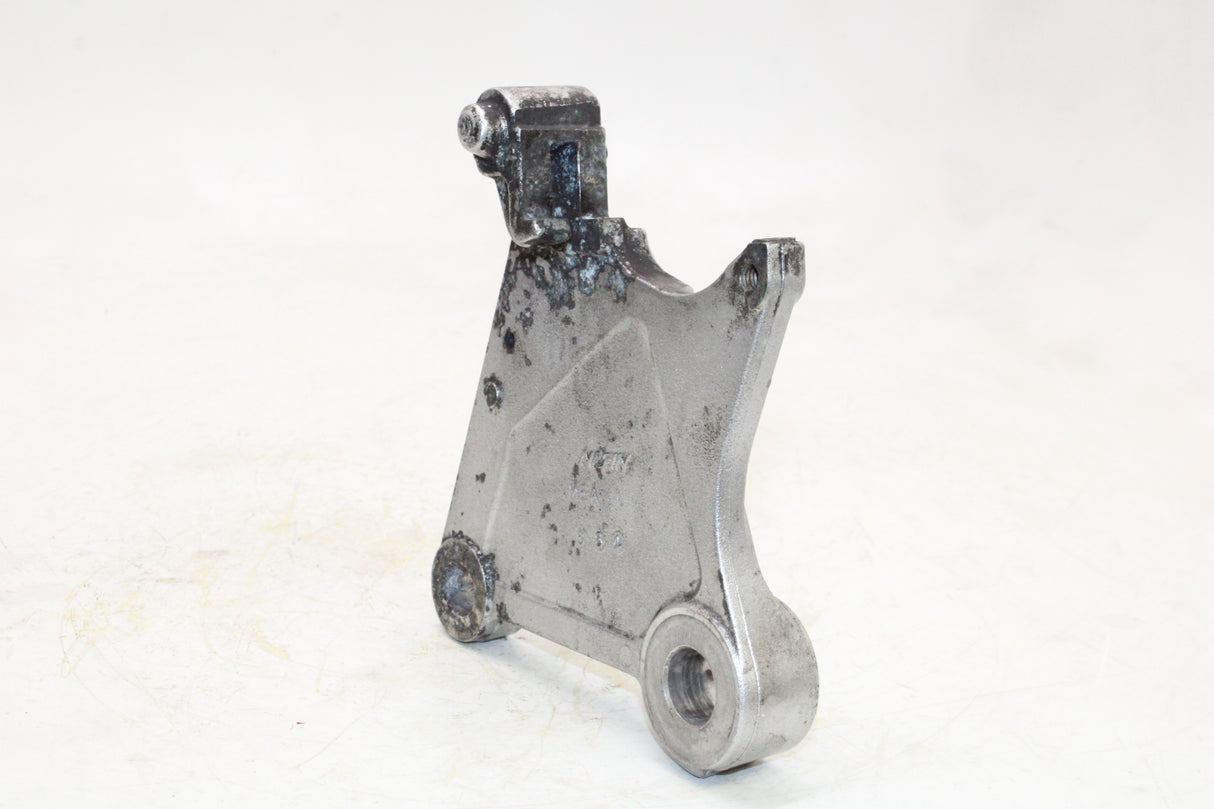 2004 Honda VTX1300C OEM REAR BACK BRAKE CALIPER MOUNT BRACKET