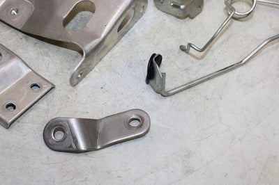 06-07 SUZUKI GSXR 750 OEM MOUNTING BRACKETS MOUNTS CHROME COVERS