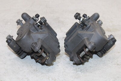 06-08 KAWASAKI NINJA 650R OEM RIGHT LEFT FRONT BRAKE CALIPER SET PAIR CALIPERS