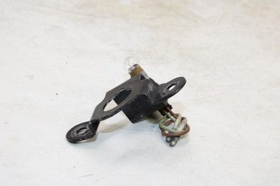 1983 Kawasaki KLT250 OEM LIGHT MOUNT W BULB