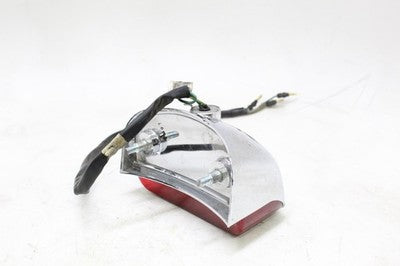 2007 HONDA REBEL 250 CMX250C OEM TAILLIGHT REAR TAIL BRAKE LIGHT W CHROME COVER