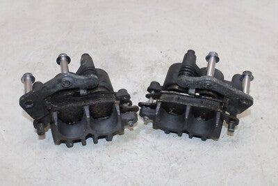 06-08 KAWASAKI NINJA 650R OEM RIGHT LEFT FRONT BRAKE CALIPER SET PAIR CALIPERS
