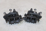 06-08 KAWASAKI NINJA 650R OEM RIGHT LEFT FRONT BRAKE CALIPER SET PAIR CALIPERS