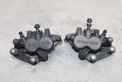 06-08 KAWASAKI NINJA 650R OEM RIGHT LEFT FRONT BRAKE CALIPER SET PAIR CALIPERS