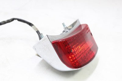 2007 HONDA REBEL 250 CMX250C OEM TAILLIGHT REAR TAIL BRAKE LIGHT W CHROME COVER
