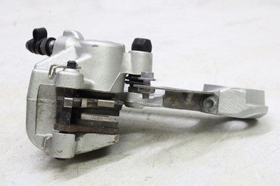 2009 BMW G450X OEM REAR BACK BRAKE CALIPER W MOUNT