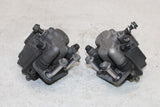 06-08 KAWASAKI NINJA 650R OEM RIGHT LEFT FRONT BRAKE CALIPER SET PAIR CALIPERS