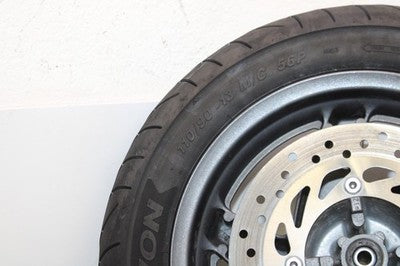 04-07 HONDA REFLEX SPORT 250 NSS250S OEM FRONT WHEEL RIM W TIRE